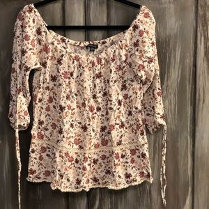 White flowery blouse